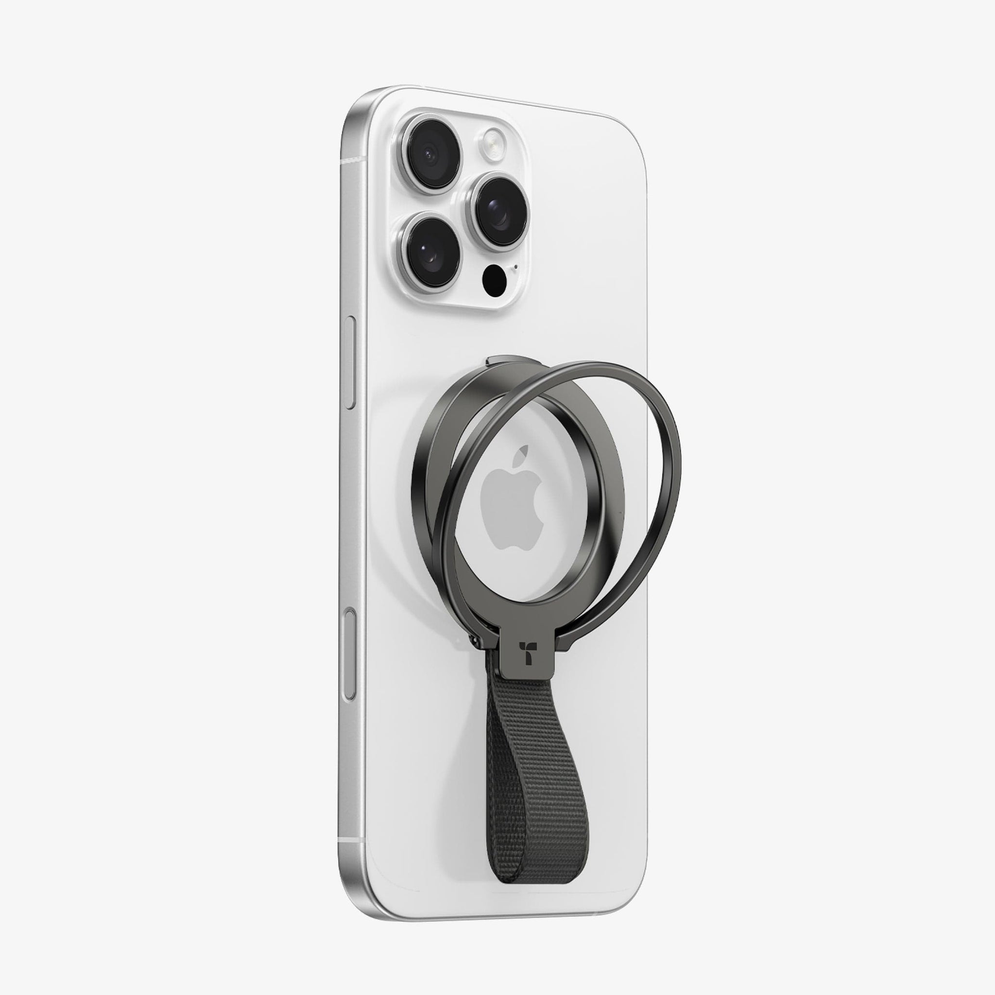 ダークグレーのOmniRing磁性フォンリングホルダーで、ファブリックストラップ付き、ホワイトのiPhoneに取り付けられています。