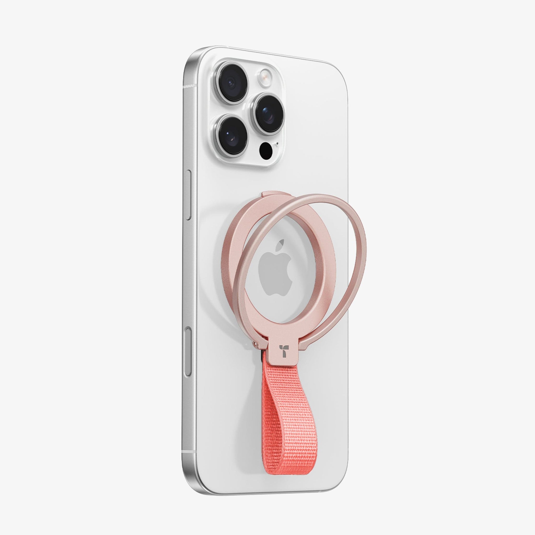 ピンクのストラップ付きローズゴールドのOmniRing磁気リングを白いiPhoneに装着。
